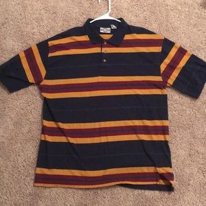 red, green, and yellow stripped blue polo shirt